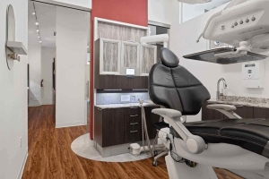 Modern dental office at Villanova Dental Studio in Stittsville, ON, with a dental chair and sink