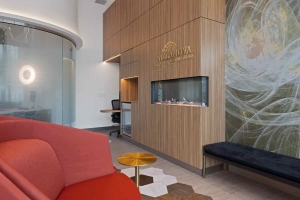 Modern office lobby of Villanova Dental Studio in Stittsville, ON, with a prominent wall painting