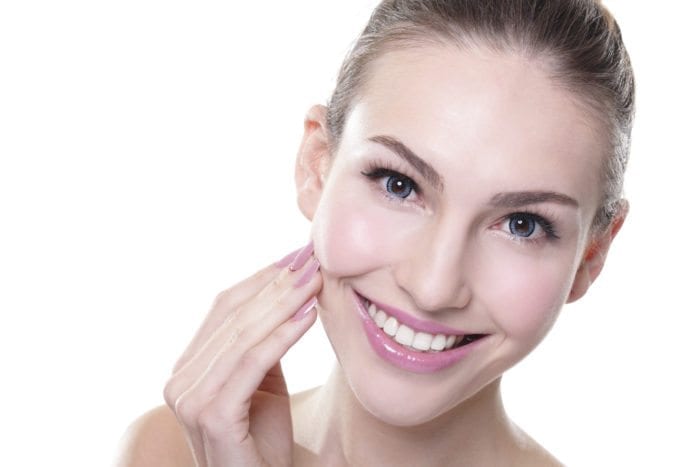 A Woman Smiles Brightly on The Effects of Tooth Whitening Treatment in Stittsville, ON