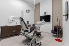 Dental chair in front of TV at Villanova Dental Studio