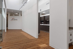 A Modern Office hallway featuring a Sink located in the Dental Studio in Stittsville, ON