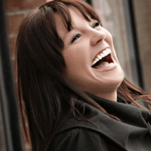 image of laughing woman with perfect teeth from Villanova Dental Studio