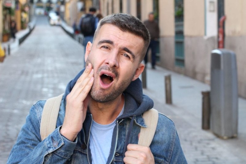 A Man Experiencing Jaw Pain